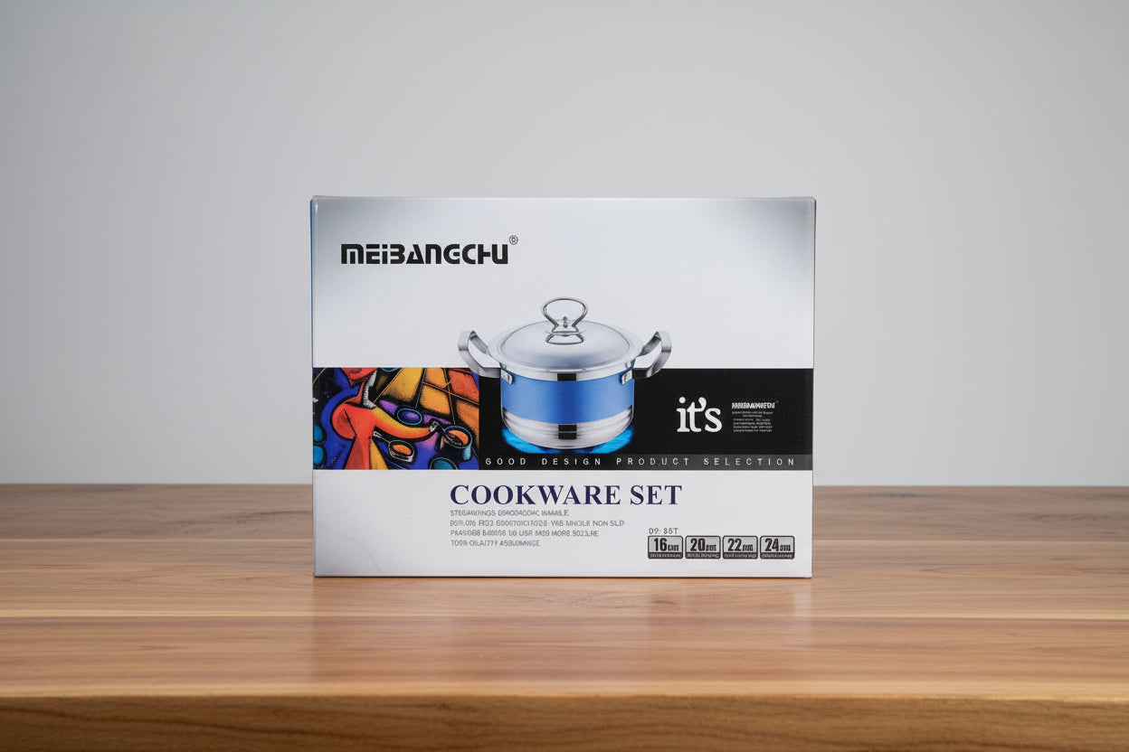 Cookware set packaging with 'Meibangchu' branding on a wooden surface