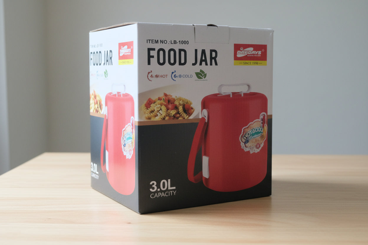 Red food jar with packaging on a cardboard surface