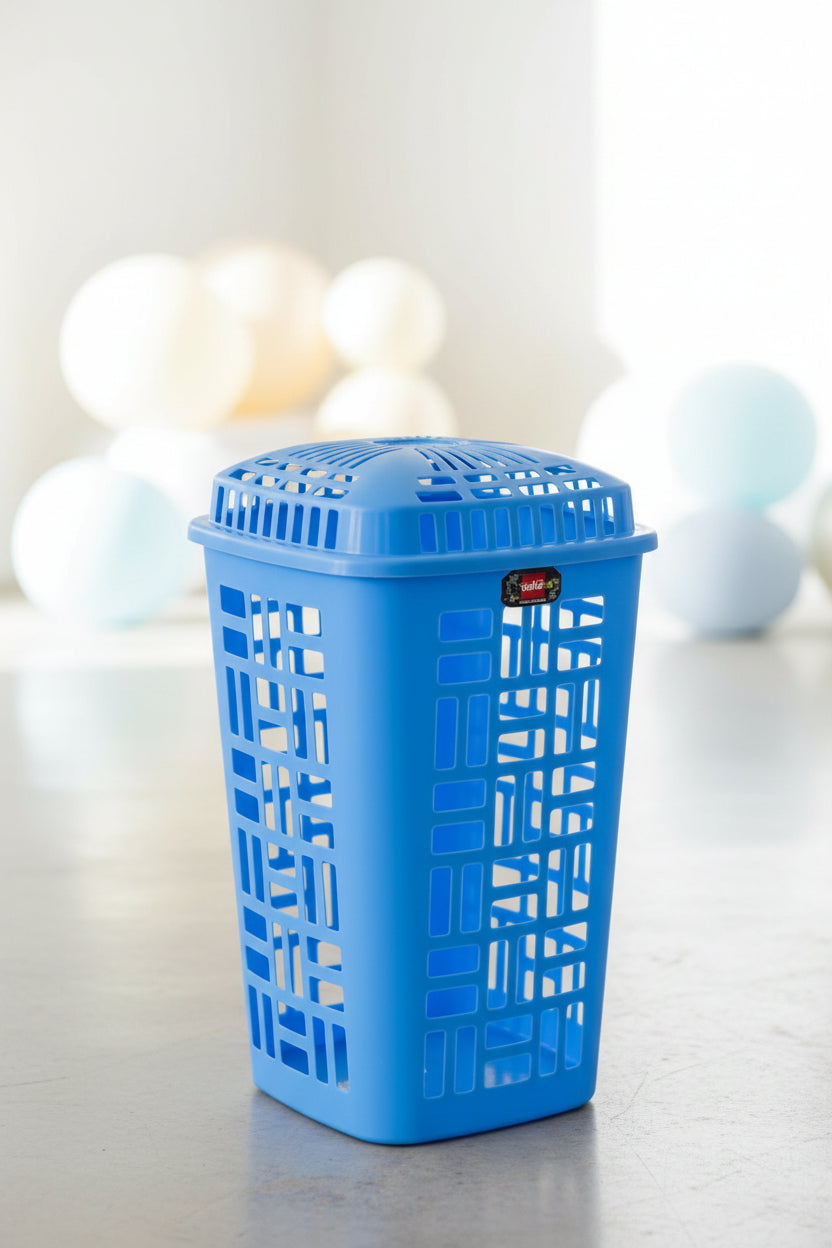 Blue plastic basket on a concrete surface