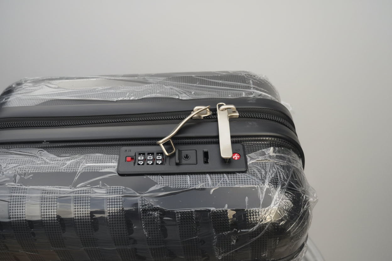 Black suitcase with a combination lock on a clear background