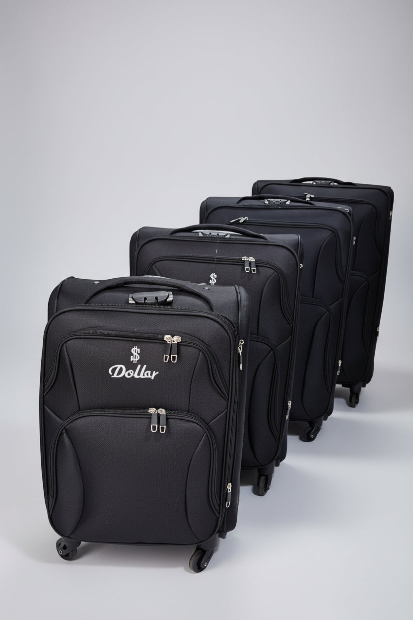 Row of black suitcases with 'Dollar' branding in a storage area.