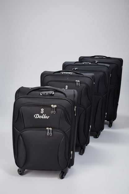 Row of black suitcases with 'Dollar' branding in a storage area.
