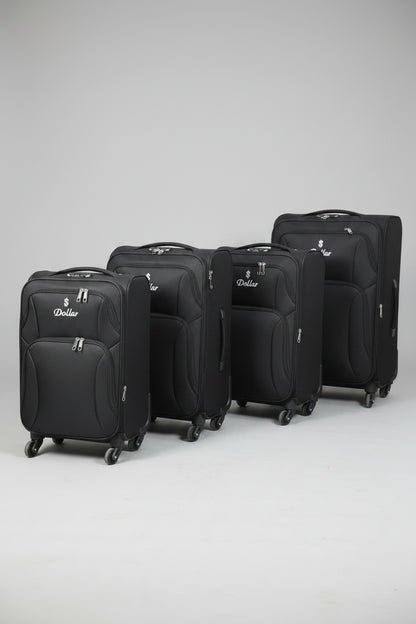 Row of black suitcases with a visible brand logo on a concrete floor.