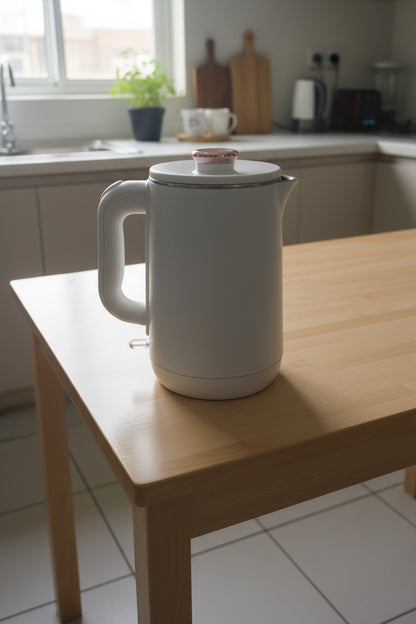 EG&M ELECTRIC KETTLE white container with a lid in an outdoor market setting