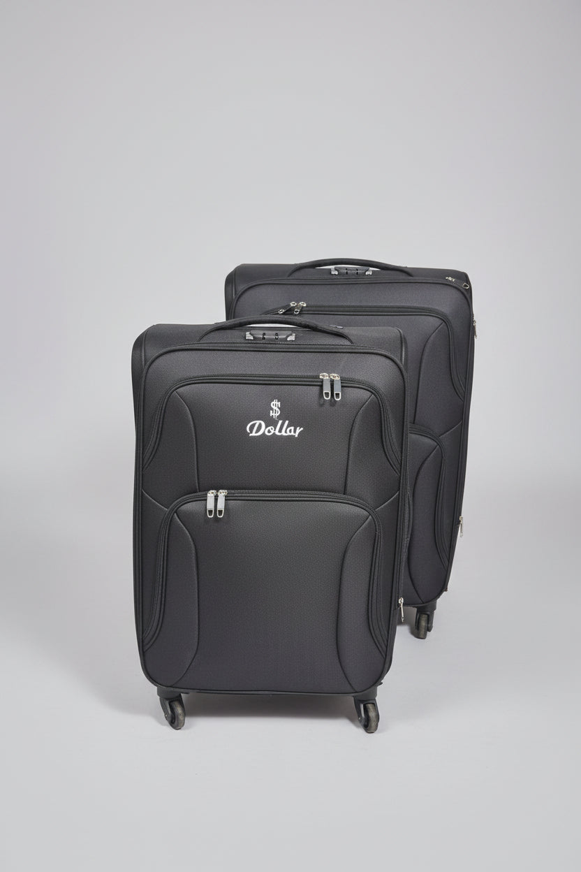 Row of gray suitcases with 'Dollar' branding in a store setting.