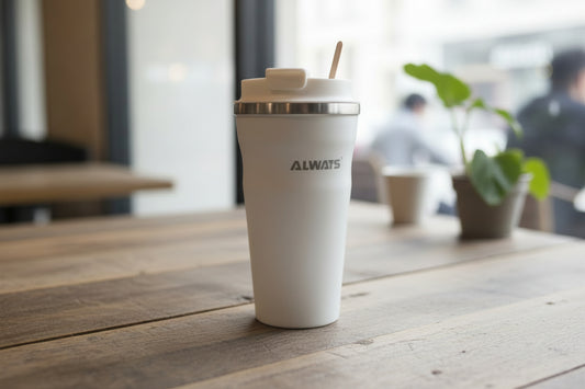 White  flask with 'ALWAYS' branding on a blurred background