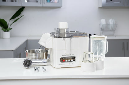  Deluxe Kitchen Machine on a kitchen counter with attachments.