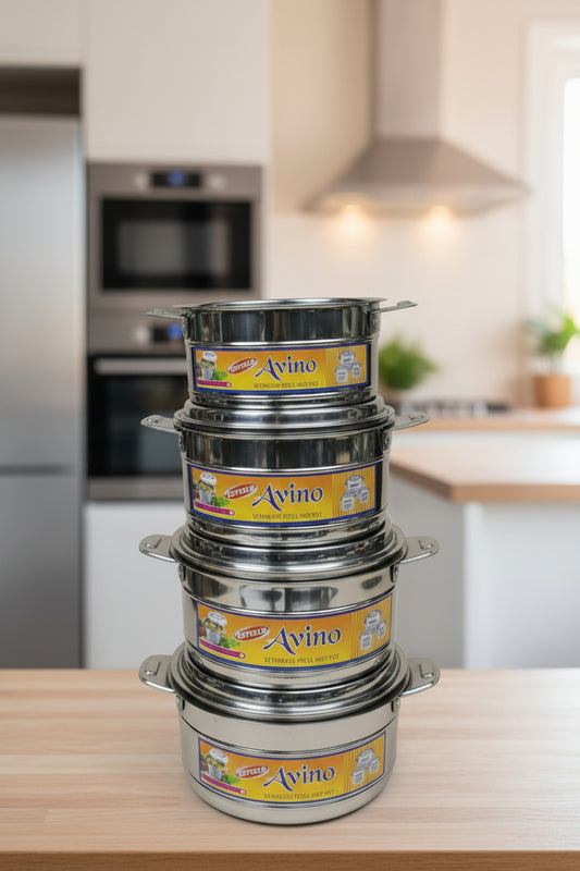 Stack of stainless steel cookware with visible brand labels on a cardboard box.