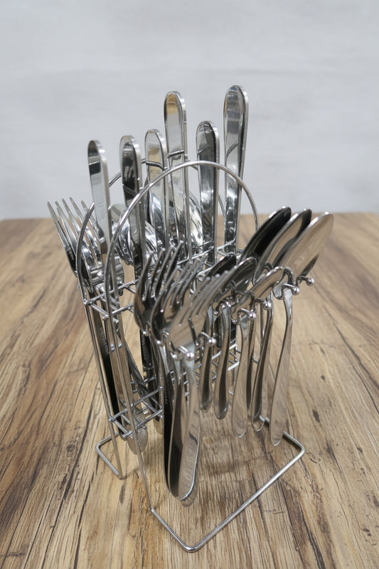 Stack of metal hooks on a blurred background