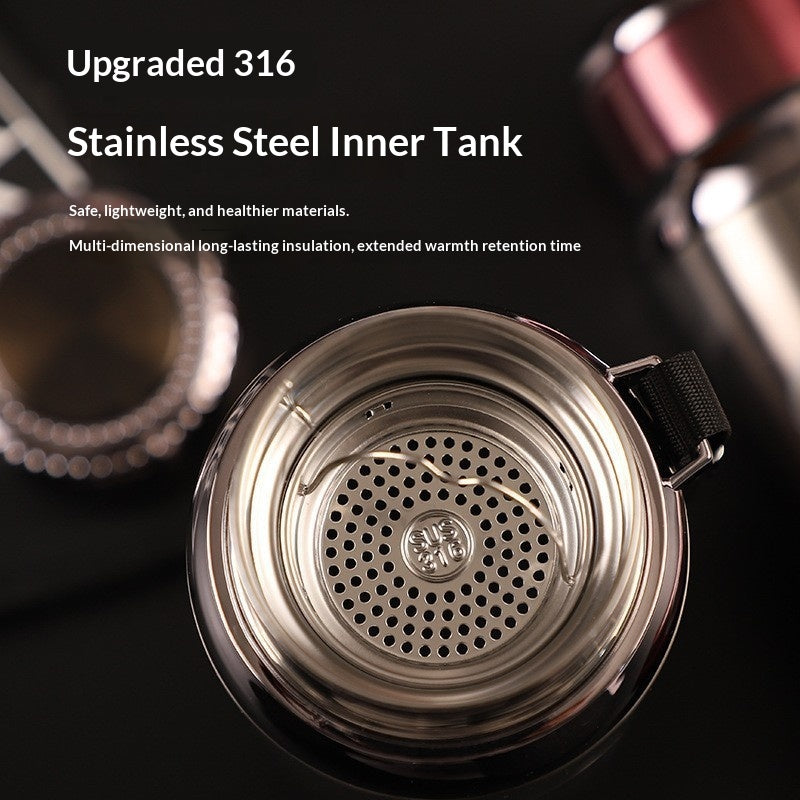 Stainless steel inner tank with text highlighting features on a dark background
