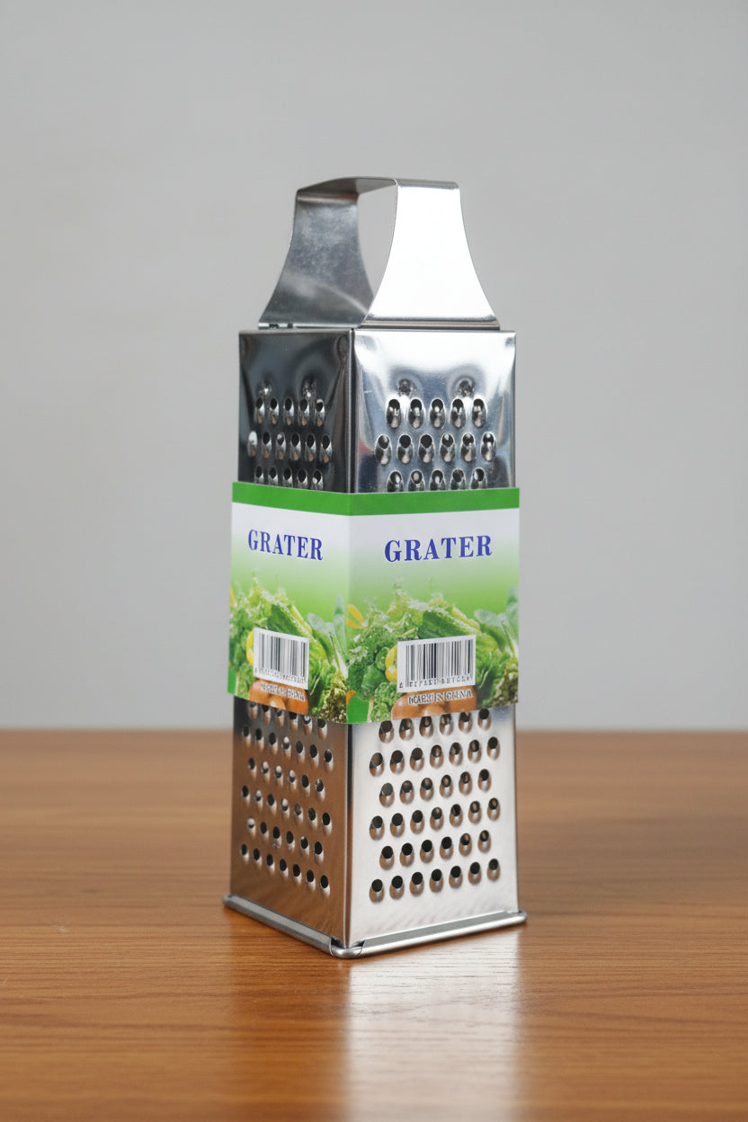 Hand holding a box of a grater with a blurred store background