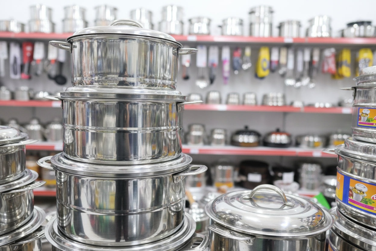 Metallic kitchenware with 'Avino' branding on a white background