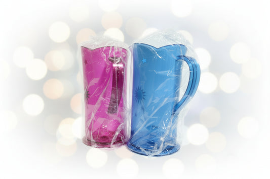 Blue and pink plastic bag with clear plastic wrap on a wooden surface
